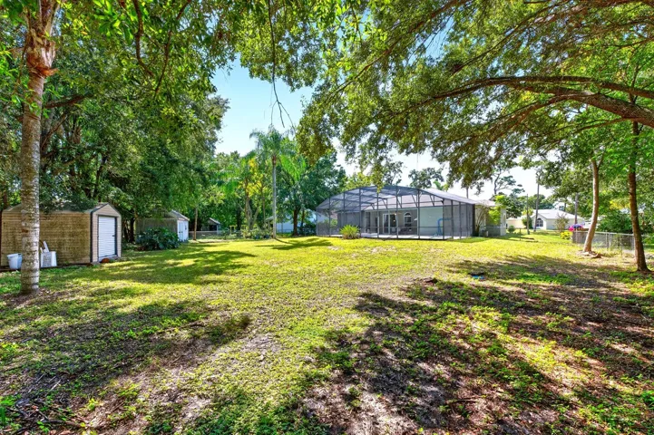 TWO STORAGE SHEDS add convenient space for tools, equipment and seasonal belongings.