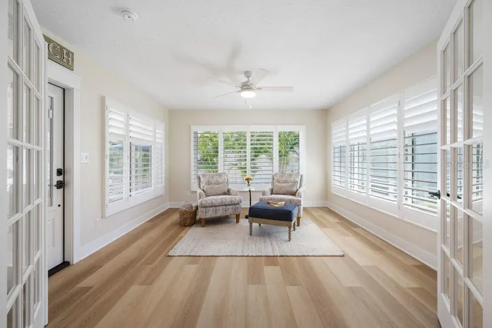 With Three Walls of Windows and Plenty of Natural Light - This Florida Room is Stunning!