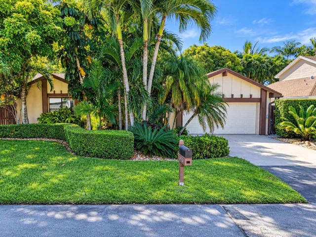 Two car garage, entry courtyard, on an oversized lot with room dedicated space for your boat in the backyard.