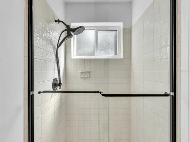 walk in shower with glass enclosure