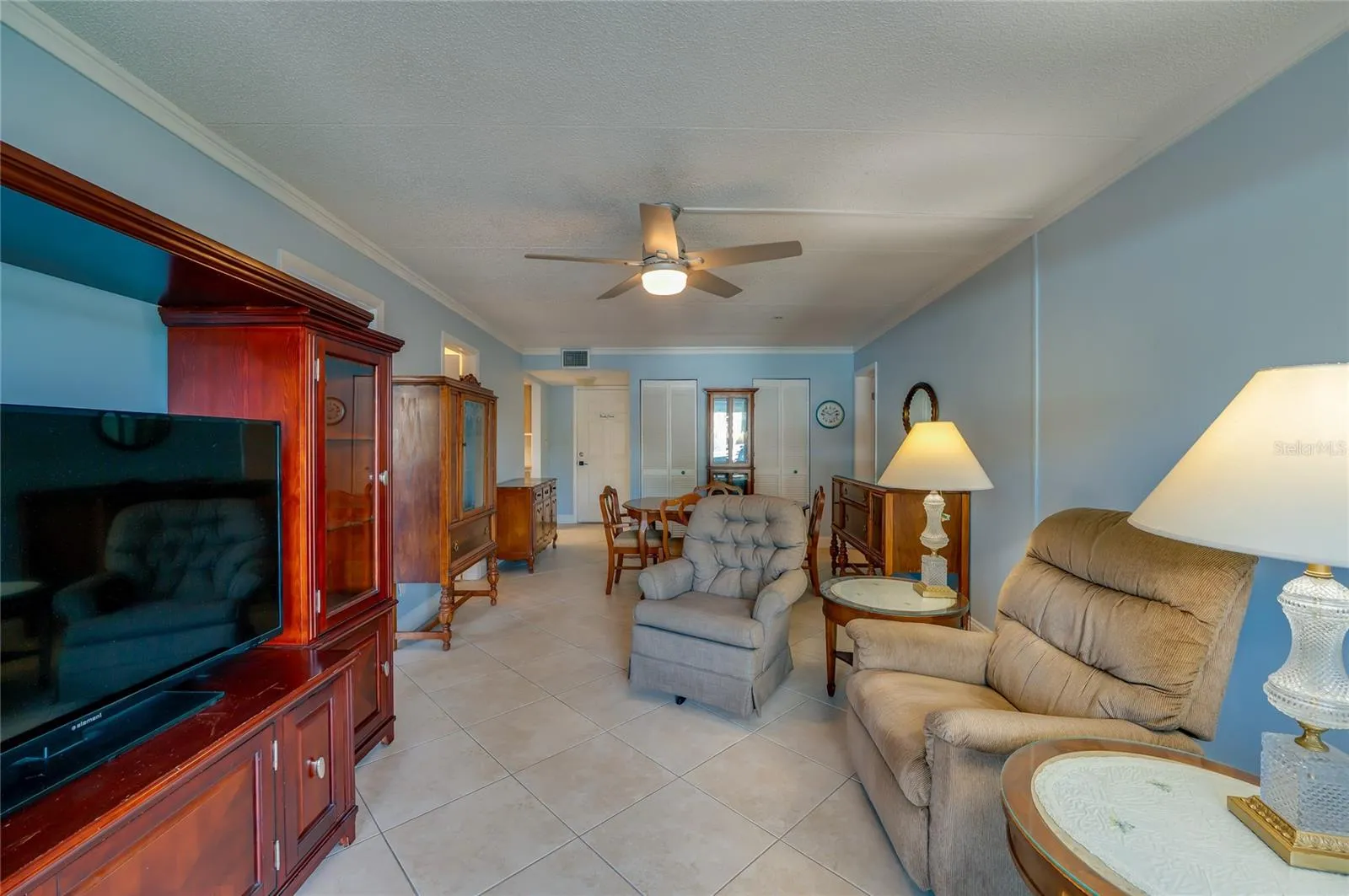 Spacious layout offering multiple seating options and an easy flow into the dining area, perfect for relaxing or hosting guests.
