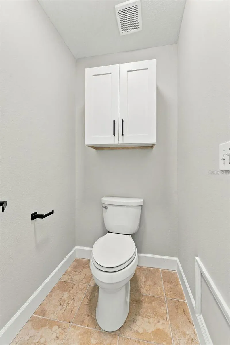Private water closet in primary bathroom