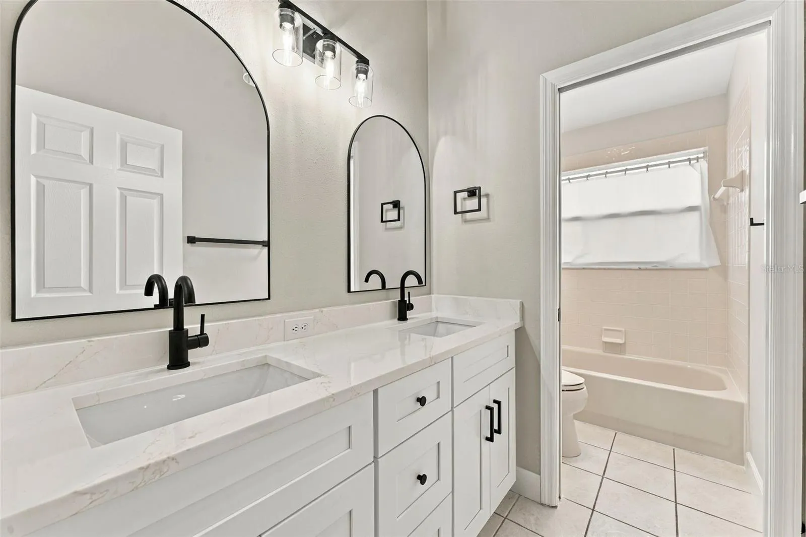 Hall bathroom upstairs with new dual vanity, lighting, mirrors &amp; fixtures