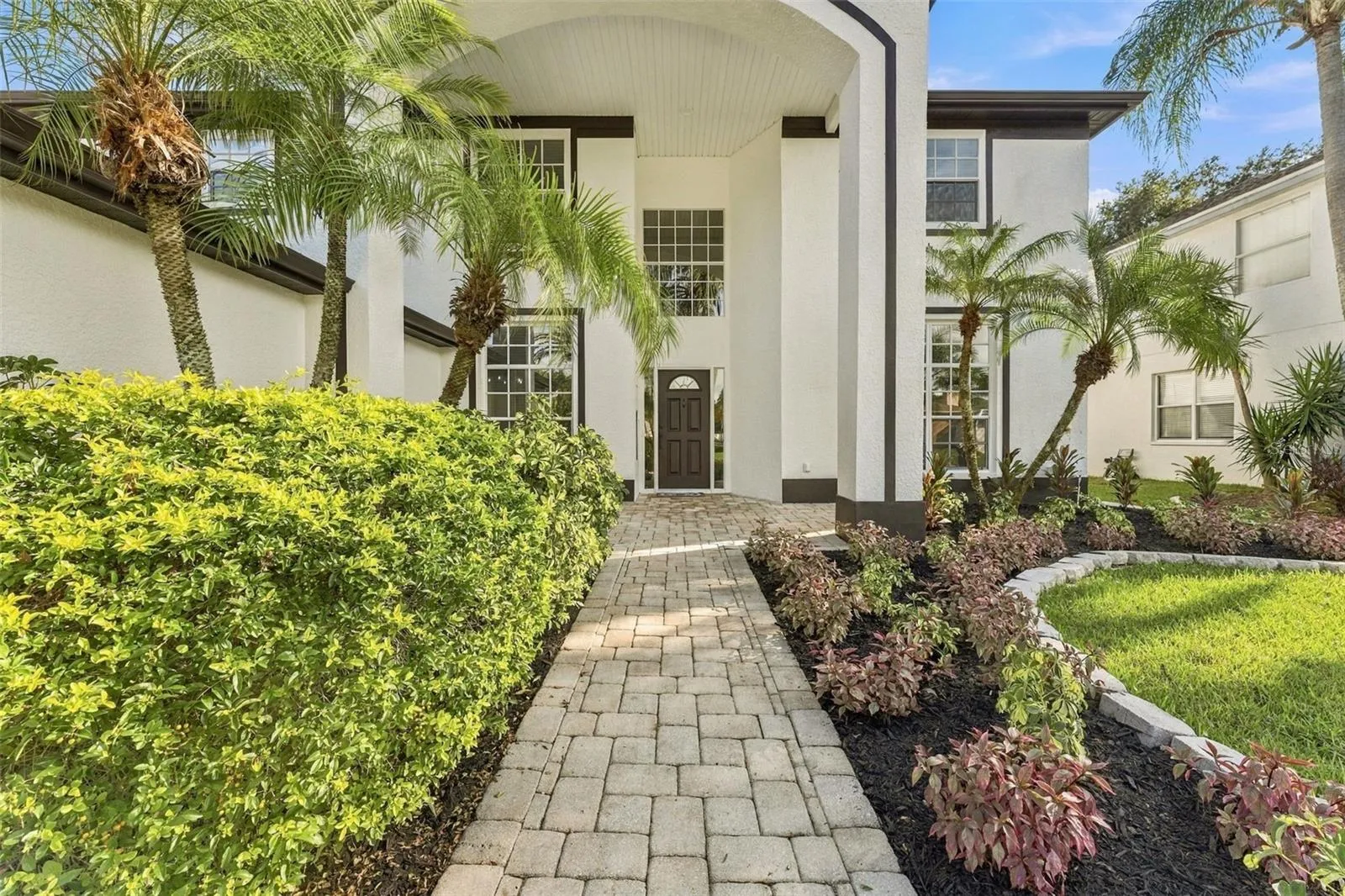 Pavered walkway leading to the front door