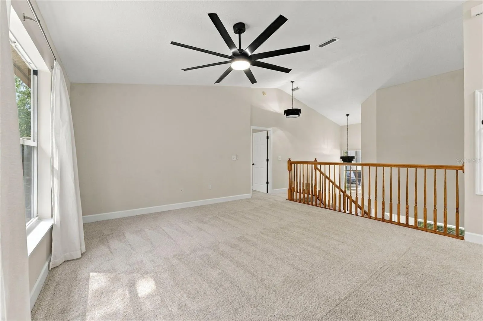 Bonus room/loft with brand new soft carpet