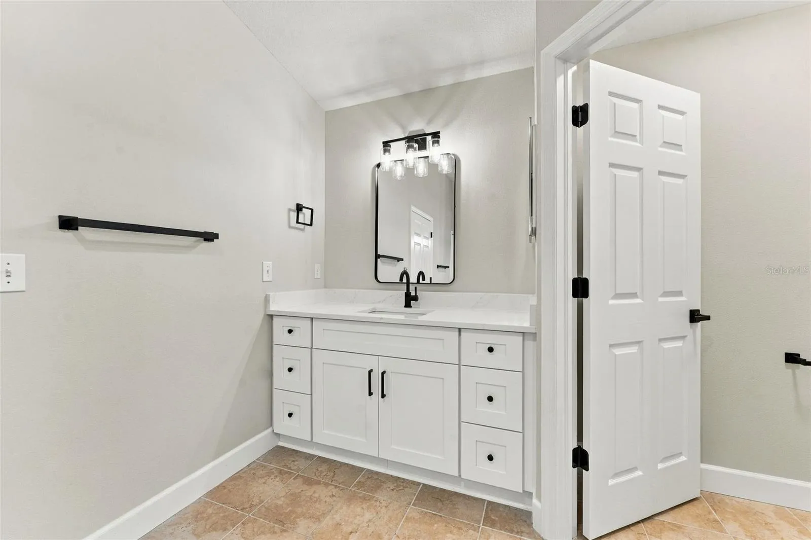 All new fixtures, finishes &amp; vanities in this primary bathroom
