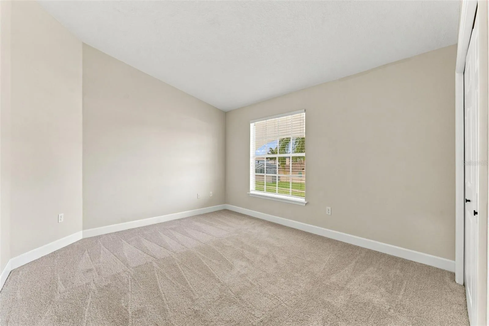 Bedroom 4 is located upstairs
