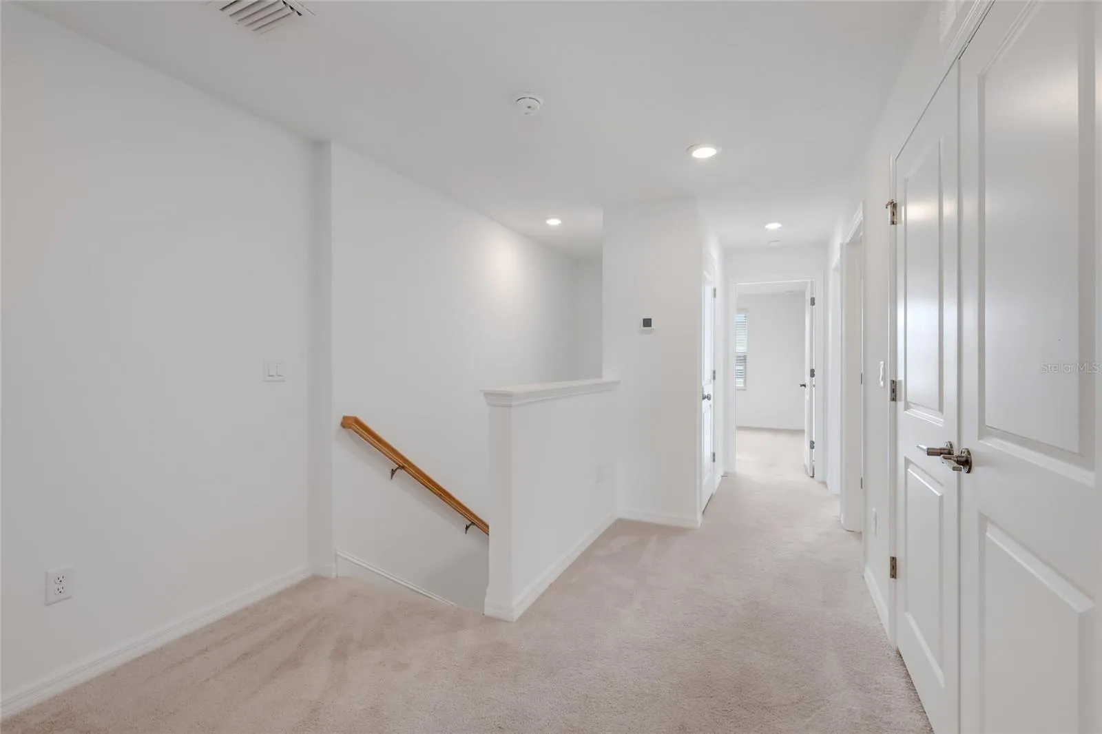 At the other end of the loft is the entrance to the other two bedrooms as well as the hall bathroom. Again, there is even more space for a small bench or another small work station area!
