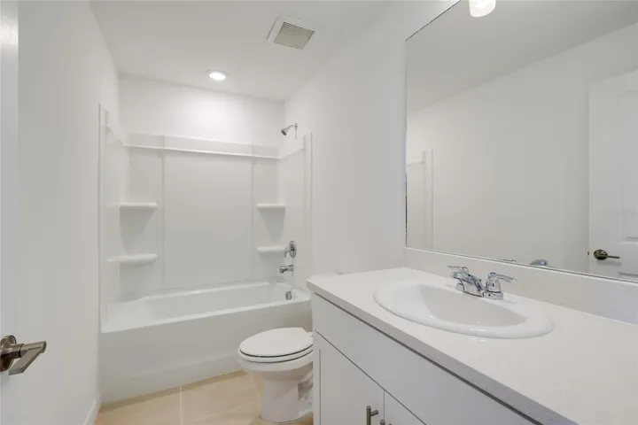 The hall bathroom is perfectly situated for use by those utilizing bedrooms 2 and 3 and has a linen closet situated just outside of the door! The tub/shower combination is perfect for any use!