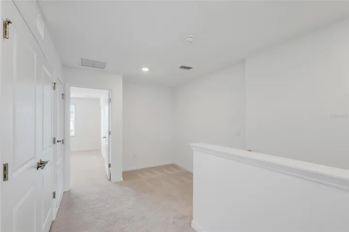 The loft area is perfect for a desk/office arrangement in the far corner! The laundry area is just off to the side providing easy use for all family members!
