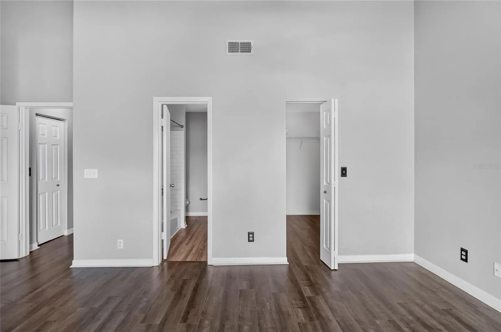 Primary Bedroom and walk in closet and bathroom