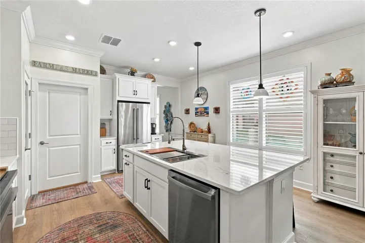 Kitchen showing shutters on the window