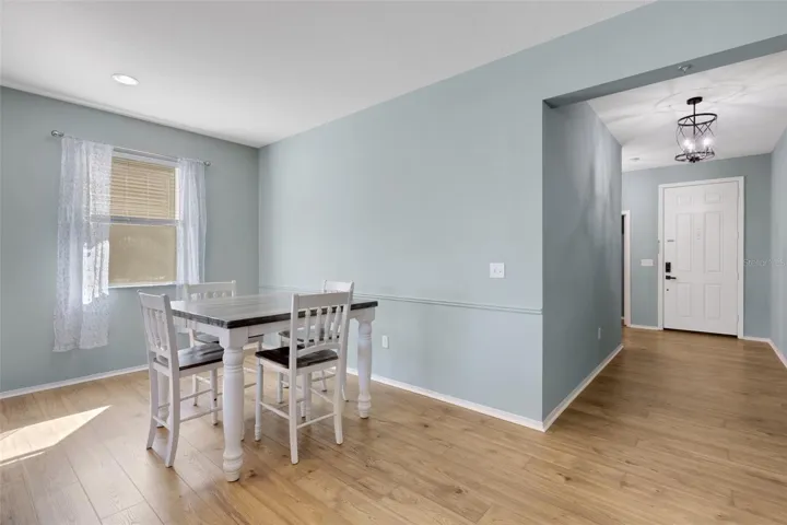 Dining Room & Hallway to Foyer/Front Entryway