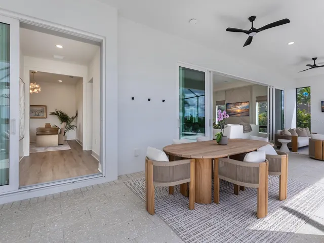 Sliders to the full pool bathroom