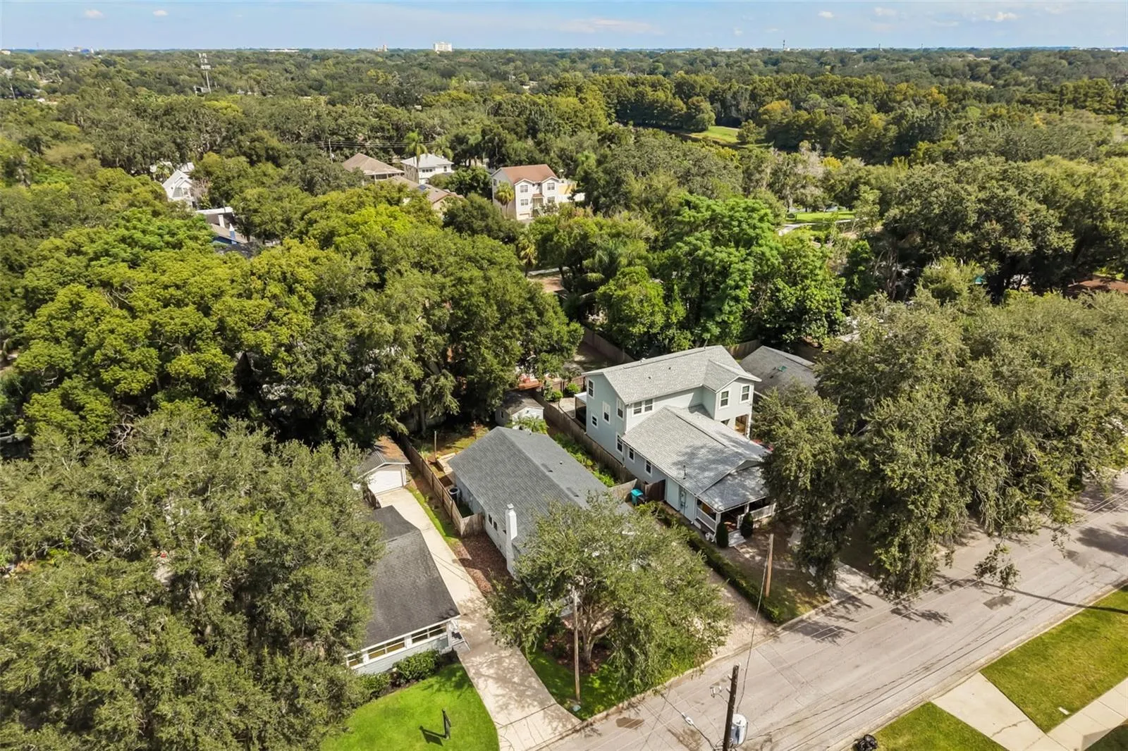 Mature, canopy trees line the streets