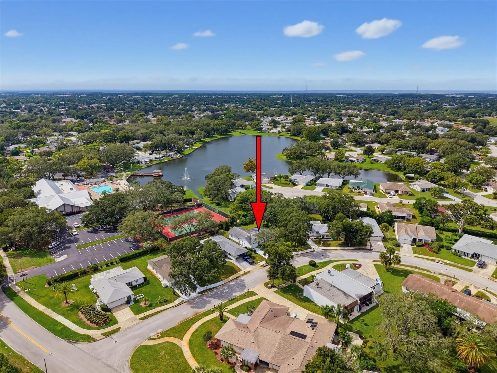 Home is located convenient to the tennis/pickleball courts & clubhouse