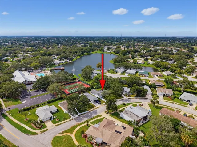 Home is located convenient to the tennis/pickleball courts & clubhouse