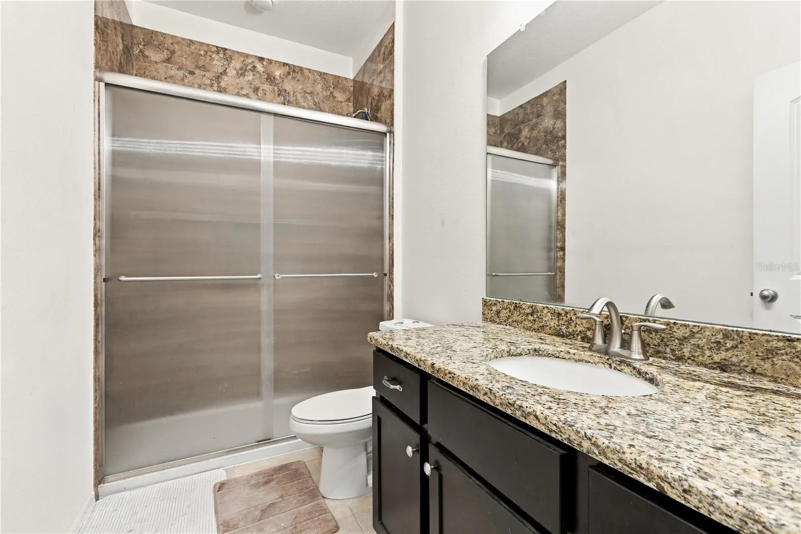 SECOND BATHROOM WITH COMPLETELY RENOVATED WALK IN SHOWER