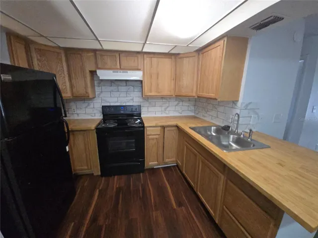 C 17 KITCHEN WITH BUTCHERBLOCK COUNTERTOPS