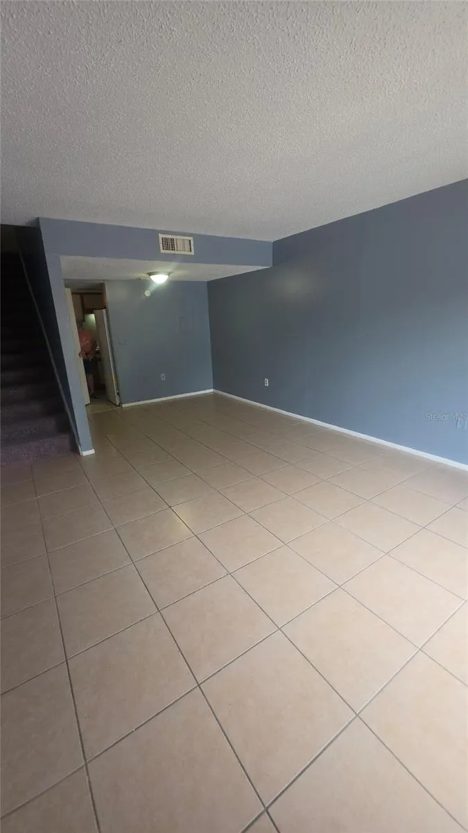 Living/dining combined with kitchen on the back right