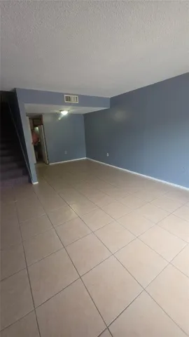 Living/dining combined with kitchen on the back right