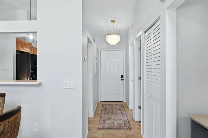Foyer entrance into condo