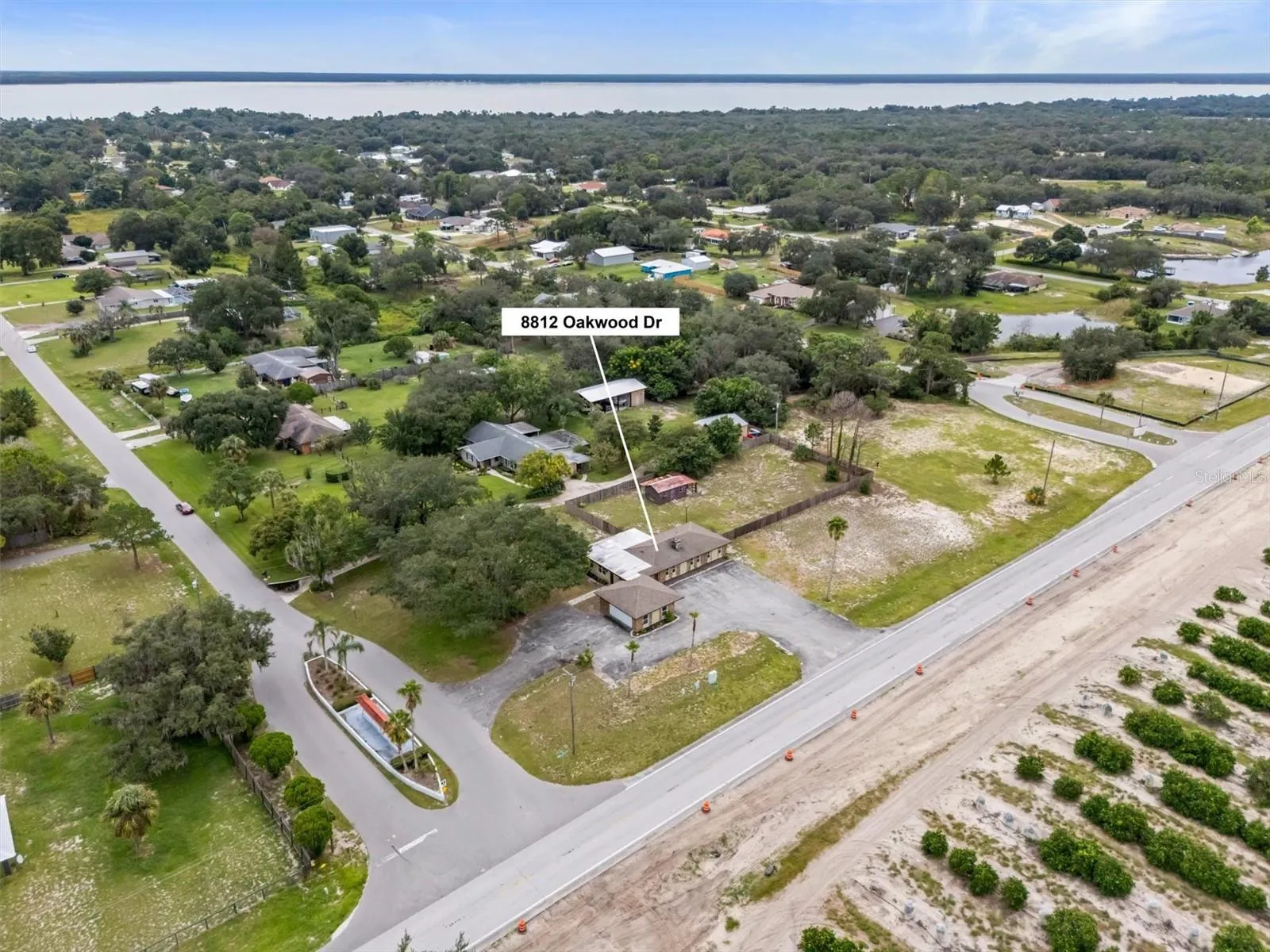 Spacious 1 acre corner lot, with fenced backyard