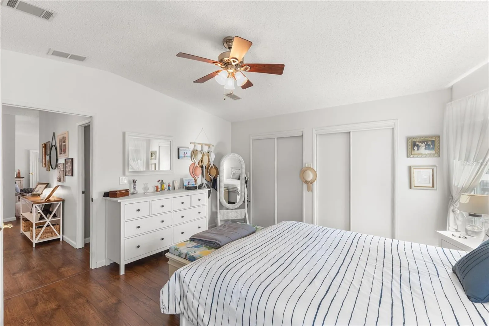 Primary bedroom--wall of closets