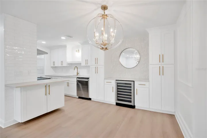 Quartz counters, bar, wine fridge