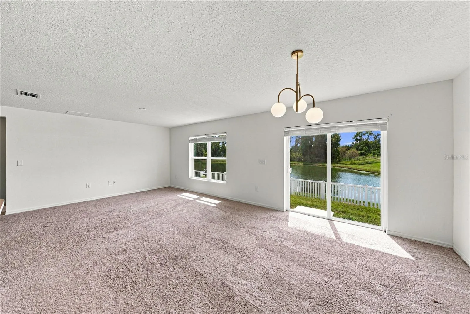 1444 Mattie Pointe_LivingRoom/DiningPondView