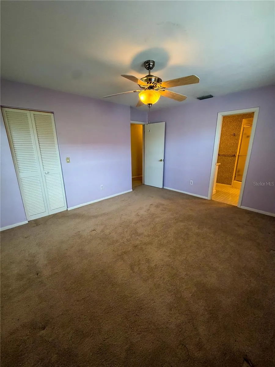 Bedroom 2 has access to the main bathroom.