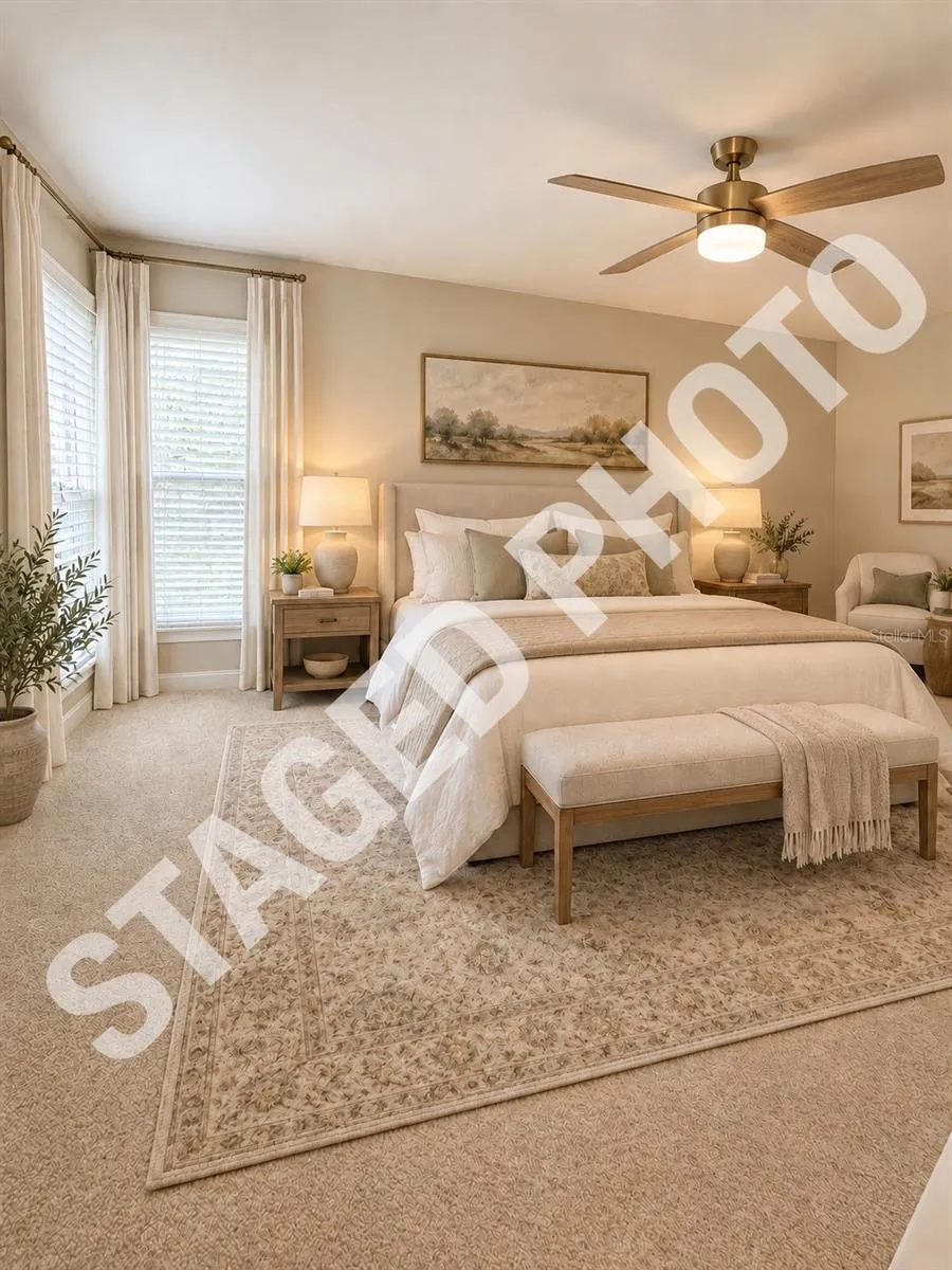 STAGED PHOTO- the only changes are paint, an area rug, drapes and furniture.