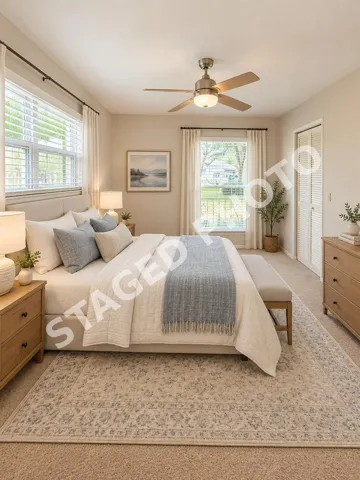 STAGED PHOTO-only changes to this room are paint, an area rug, draperies and furniture. VERY SIMPLE UPDATES.