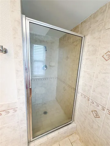 The primary ensuite offers a walk in shower.