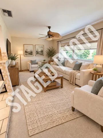 STAGED PHOTO- again the only changes were paint, curtains an area rug and furniture.
