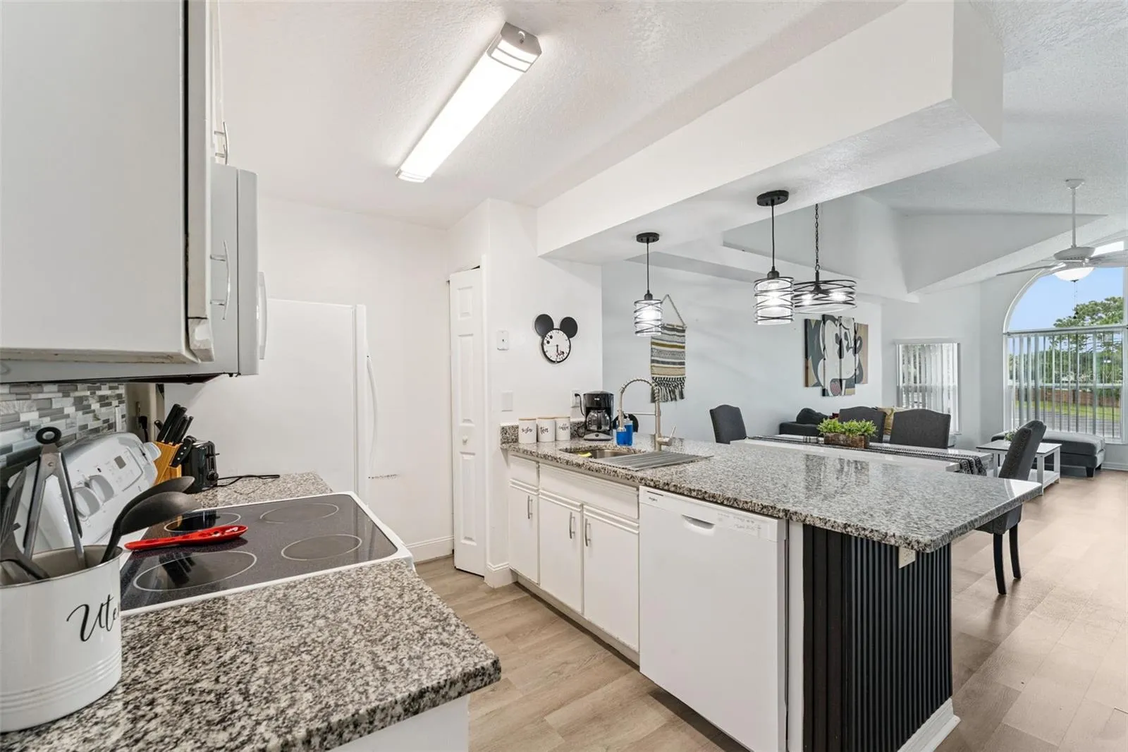 Open Kitchen Perspective: Open-concept kitchen layout showing the smooth transition into the main living and dining spaces, ideal for hosting and daily living.