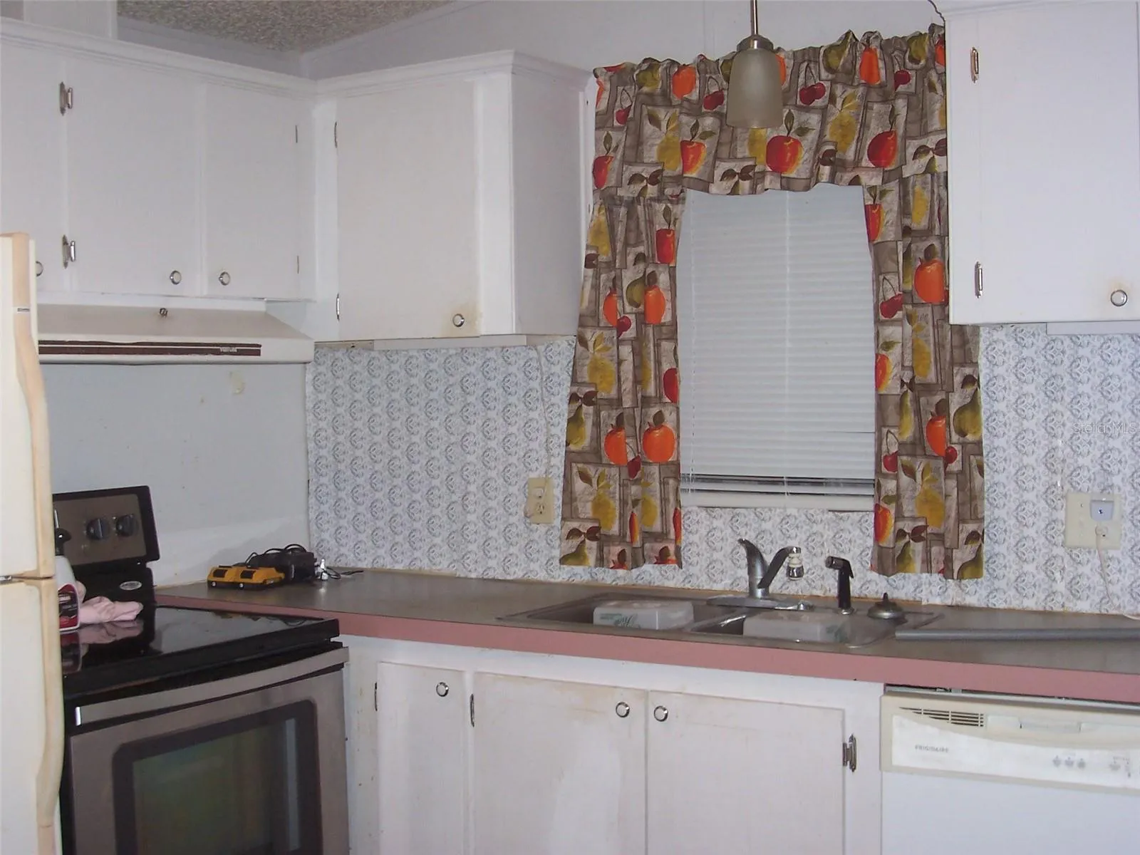 kitchen showing window to great room.