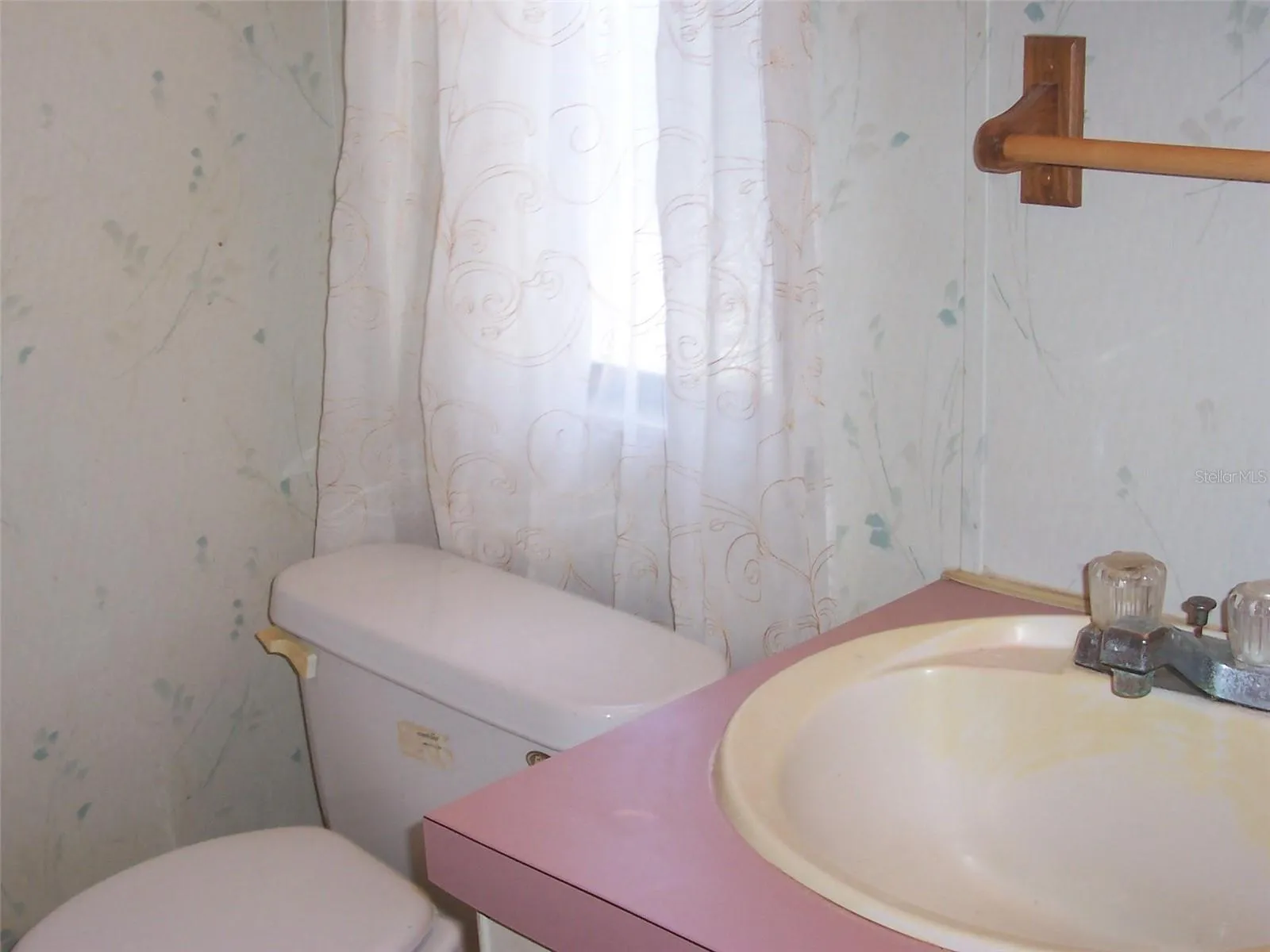 Primary Bedroom features its own bath with a walk in shower