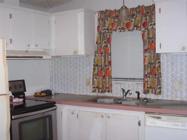 kitchen showing window to great room.