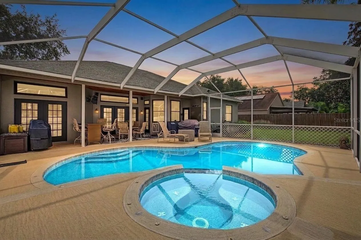 Pool/spa/ covered lanai area, completely screened and the yard is fenced in and private.
