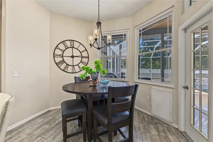 Dinette area just off of the kitchen overlooking the pool/spa.