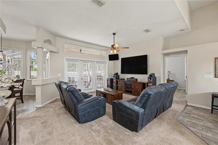Large open great room, vaulted ceilings, Ceiling fan with lights.