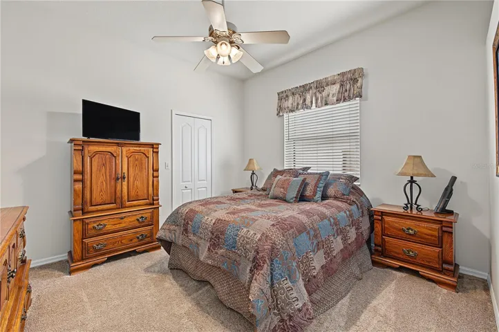 Guest Room with ceiling fan/light.