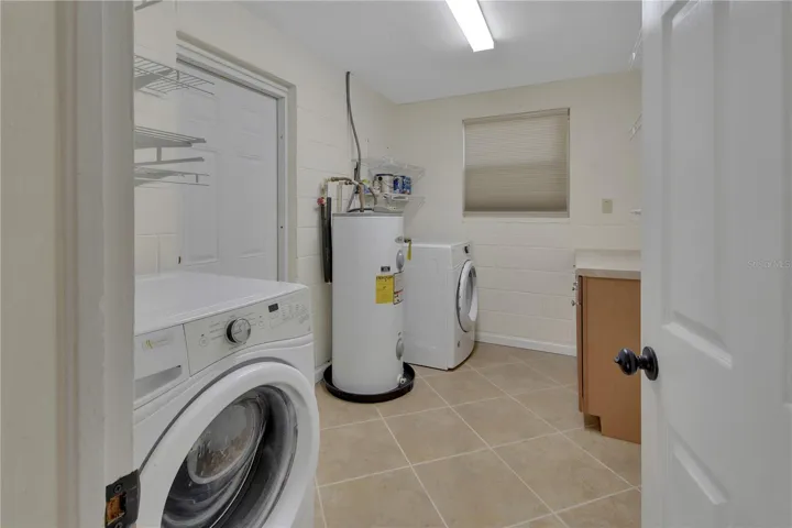 Laundry and storage leads to back yard
