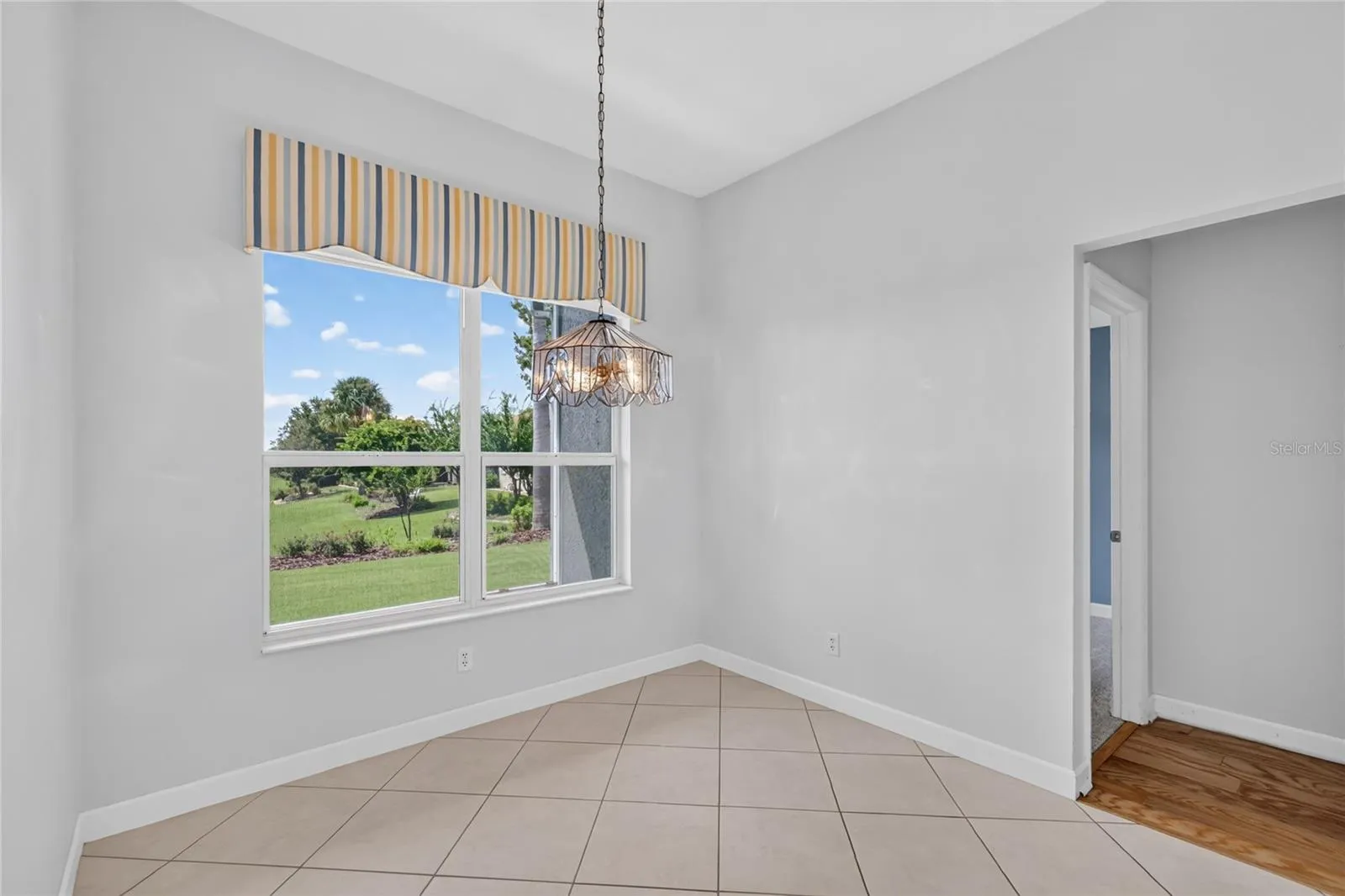 The secondary bedrooms and bathroom are tucked behind the kitchen.