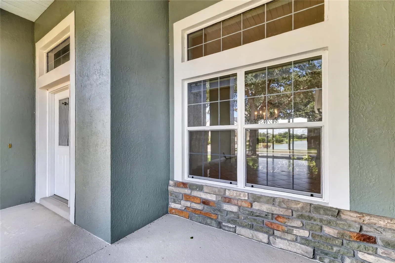The front porch is covered and a great spot to sit and relax.