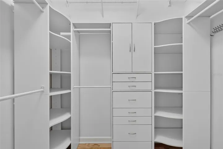 Closet organizers have been installed in the primary closet.