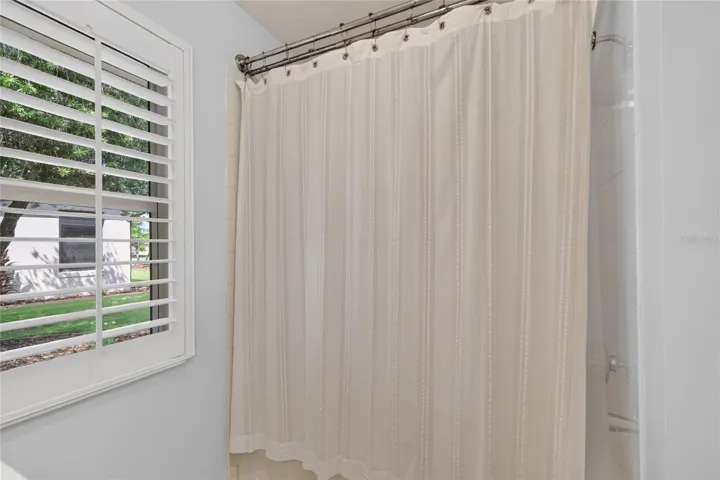 The tiled tub/shower is great for guests.