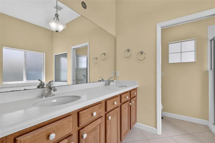 The oak cabinets and solid surface countertops provide lots of storage and space.