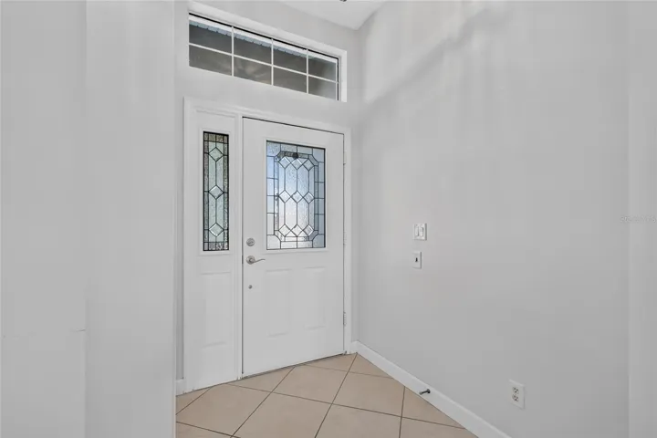 The foyer is light filled and creates an inviting entry to the home.